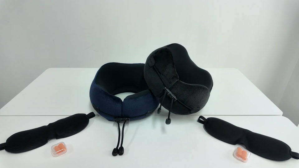 Zeoprix Classic travel pillows in navy blue and black with their eye masks and earplugs